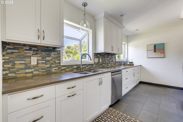 6220 SW 45th Ave, Portland, OR 97221 - kitchen with dishwasher, a sink, plenty of natural light, decorative backsplash, and recessed lighting