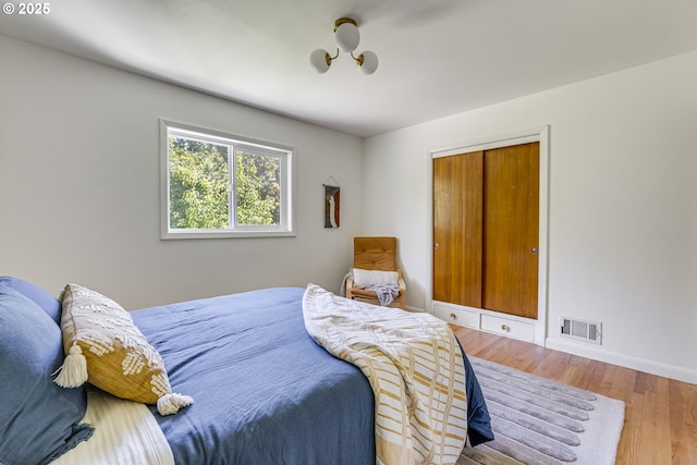 6220 SW 45th Ave, Portland, OR 97221 - bedroom with wood finished floors and baseboards