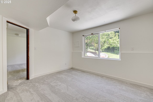6220 SW 45th Ave, Portland, OR 97221 - spare room featuring carpet floors and baseboards
