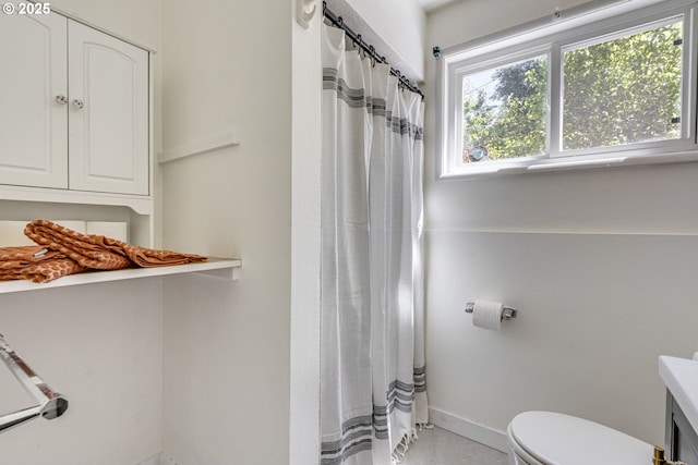 6220 SW 45th Ave, Portland, OR 97221 - full bath with toilet, baseboards, a shower with shower curtain, and vanity