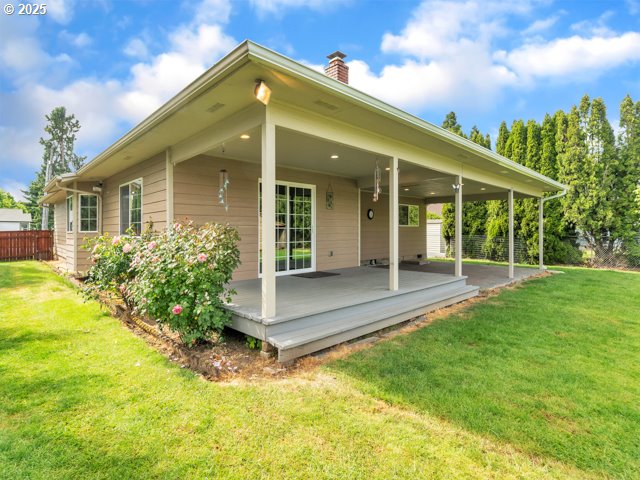 782 45th Ave, Salem, OR 97301 - back of house with a chimney and a deck
