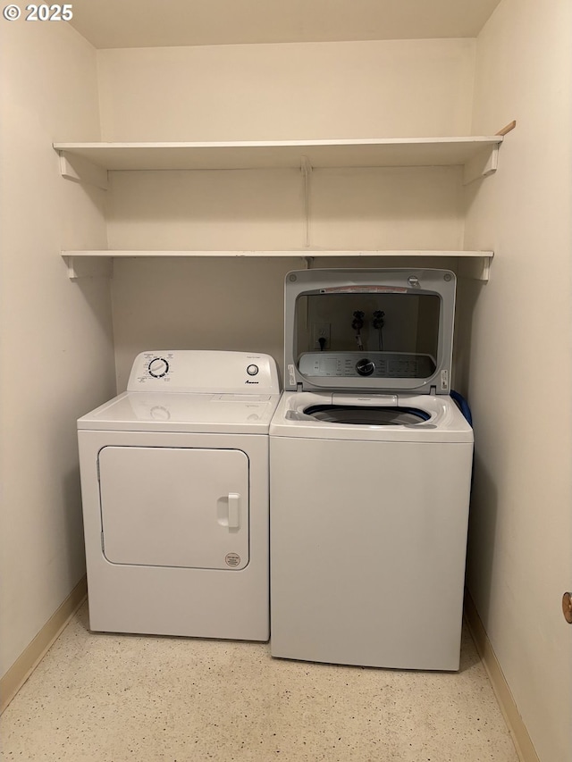 940 SW Caldew Dr, Portland, OR 97219 - laundry area featuring baseboards and independent washer and dryer