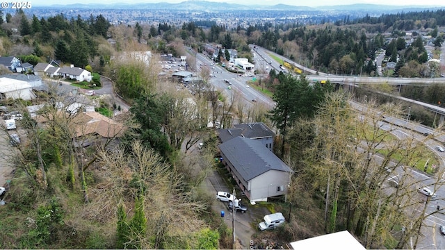 940 SW Caldew Dr, Portland, OR 97219 - aerial view of property's location featuring a heavily wooded area