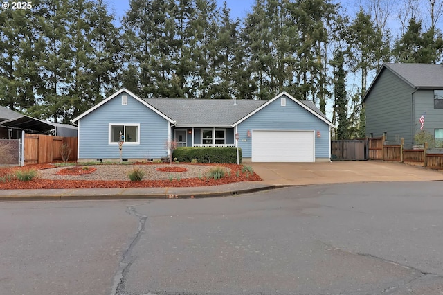 ranch-style house with crawl space, an attached garage, concrete driveway, and fence