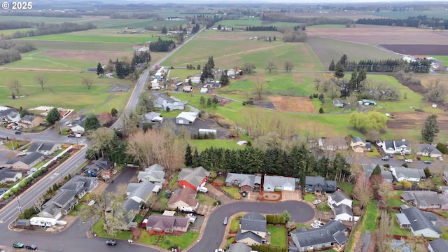 birds eye view of property with a residential view and a rural view