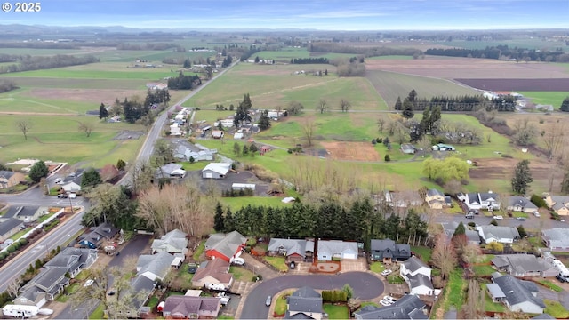 bird's eye view featuring a residential view and a rural view