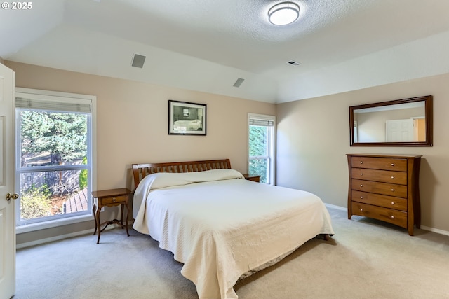 8650 SW Turquoise Loop, Beaverton, OR 97007 - bedroom with light carpet, baseboards, and vaulted ceiling