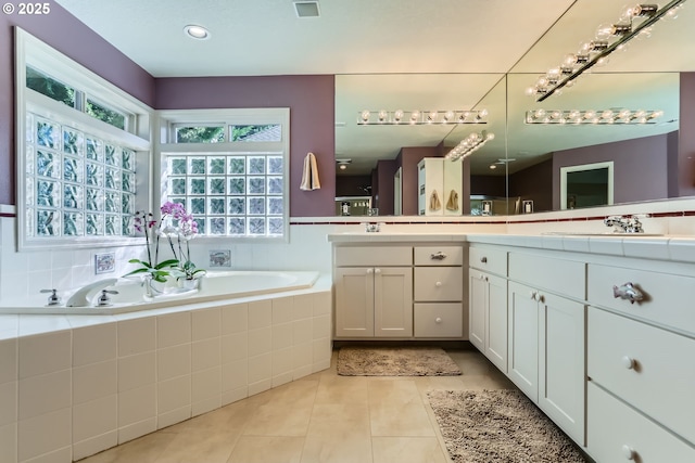 8650 SW Turquoise Loop, Beaverton, OR 97007 - bathroom with tile patterned floors, a bath, and vanity