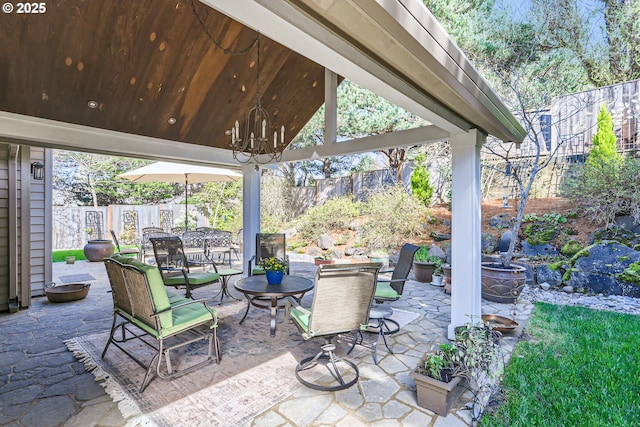 8650 SW Turquoise Loop, Beaverton, OR 97007 - view of patio / terrace with a fenced backyard and outdoor dining area