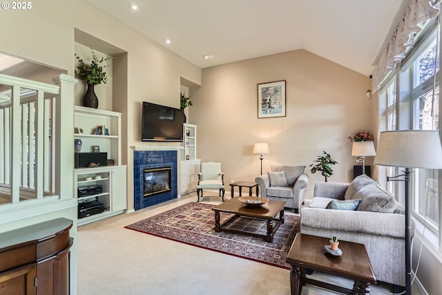 8650 SW Turquoise Loop, Beaverton, OR 97007 - living area with a fireplace, vaulted ceiling, carpet, and recessed lighting