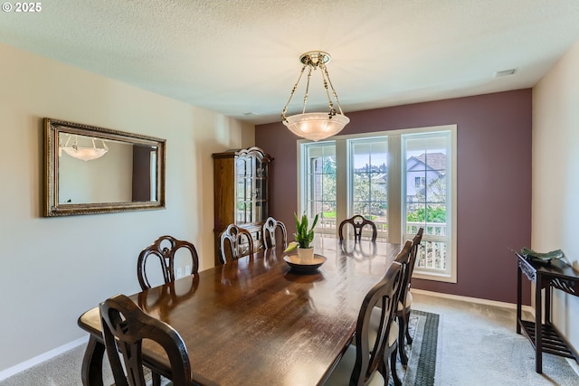 8650 SW Turquoise Loop, Beaverton, OR 97007 - carpeted dining area with baseboards