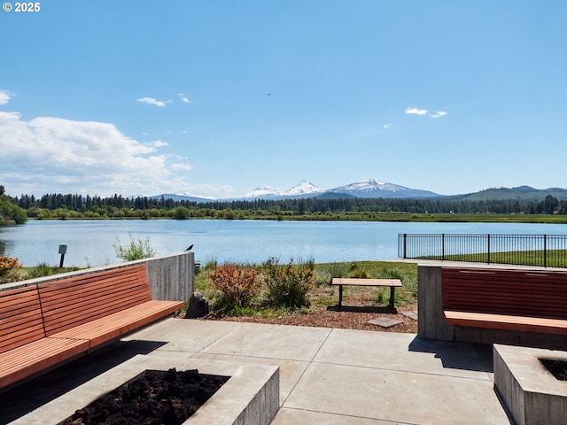 71183 Bracken Ln Unit Gh76, Black Butte Ranch, OR 97759 - view of patio / terrace featuring a fire pit and a water and mountain view