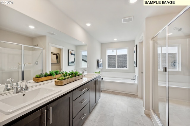 full bath featuring double vanity, a garden tub, a shower stall, a sink, and recessed lighting