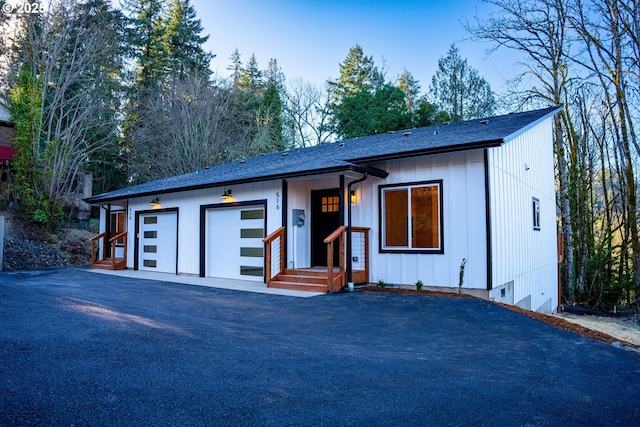 view of front of home with a garage