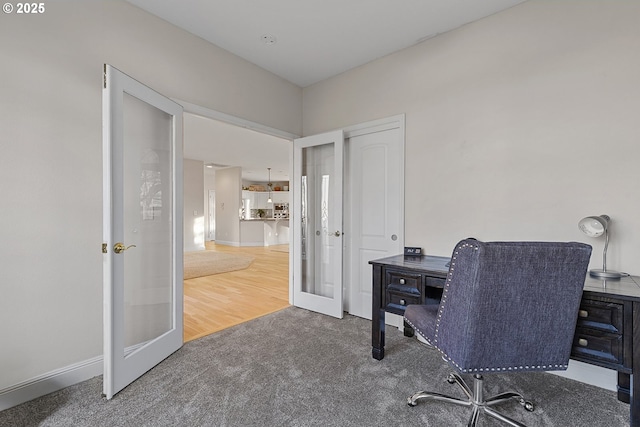 office space featuring carpet floors and french doors