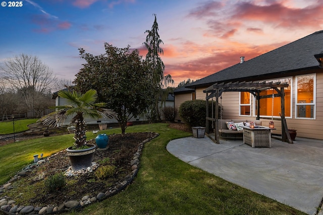 yard at dusk with a pergola, a patio area, and an outdoor living space with a fire pit