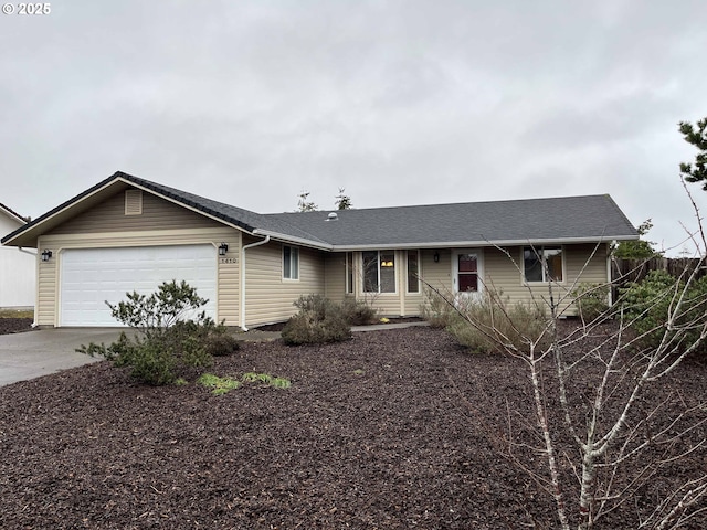 single story home featuring a garage