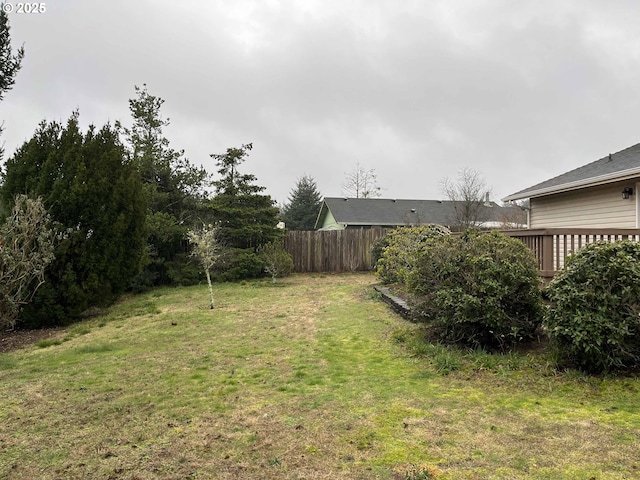 view of yard with a deck