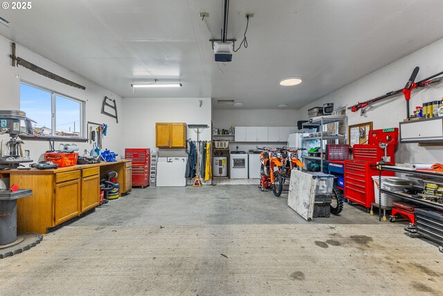 garage featuring a workshop area and a garage door opener