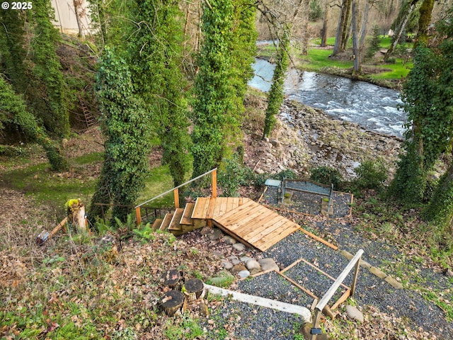 view of yard with a water view