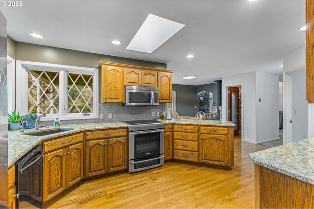 details with light stone countertops, tasteful backsplash, and sink