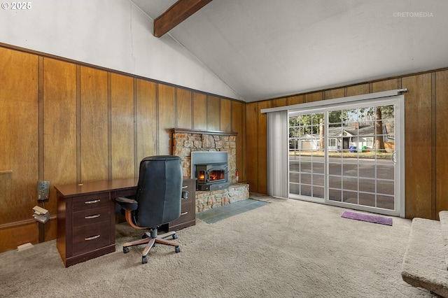 office area with high vaulted ceiling, light colored carpet, beam ceiling, and wood walls