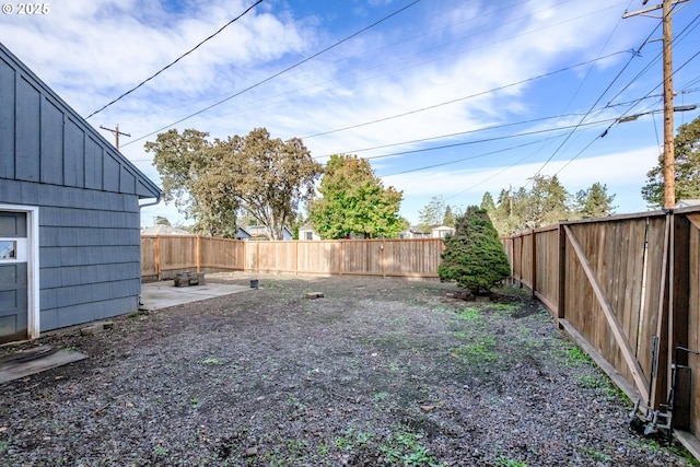 view of yard with a patio area