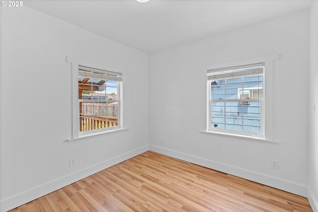 521 21st Ave, Longview, WA 98632 - empty room with wood finished floors and baseboards
