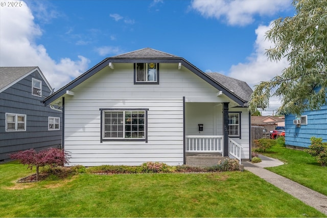 521 21st Ave, Longview, WA 98632 - bungalow-style house with a porch, a front lawn, and roof with shingles