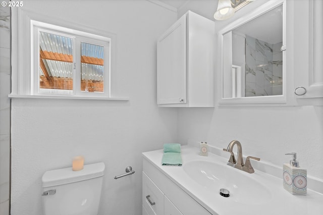 521 21st Ave, Longview, WA 98632 - bathroom with toilet, vanity, and a marble finish shower