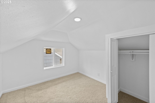 521 21st Ave, Longview, WA 98632 - bonus room featuring carpet flooring, vaulted ceiling, baseboards, and a textured ceiling