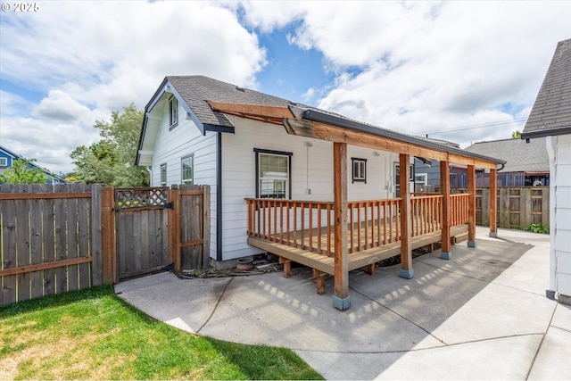 521 21st Ave, Longview, WA 98632 - rear view of property featuring a gate, a wooden deck, and a shingled roof