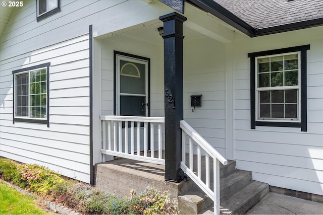 521 21st Ave, Longview, WA 98632 - doorway to property with roof with shingles