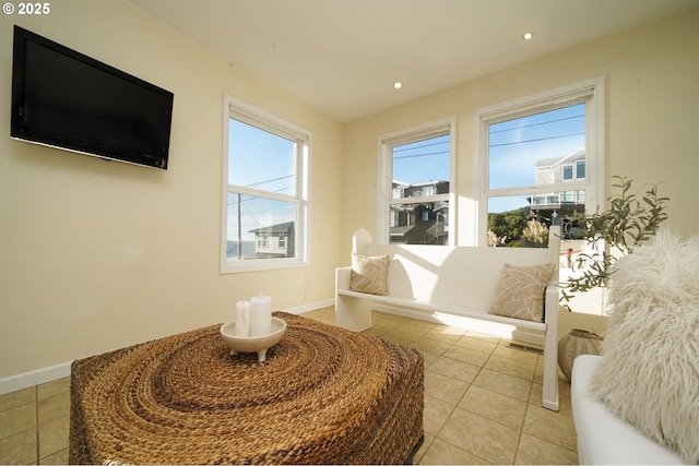 living area featuring light tile patterned floors