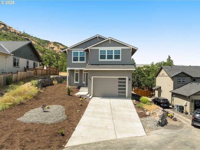 1405 Gordon Ct, The Dalles, OR 97058 - craftsman house with board and batten siding, driveway, an attached garage, and a mountain view