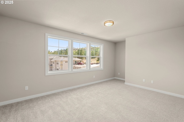 1405 Gordon Ct, The Dalles, OR 97058 - spare room with light carpet and baseboards