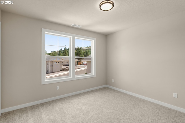 1405 Gordon Ct, The Dalles, OR 97058 - carpeted empty room featuring baseboards