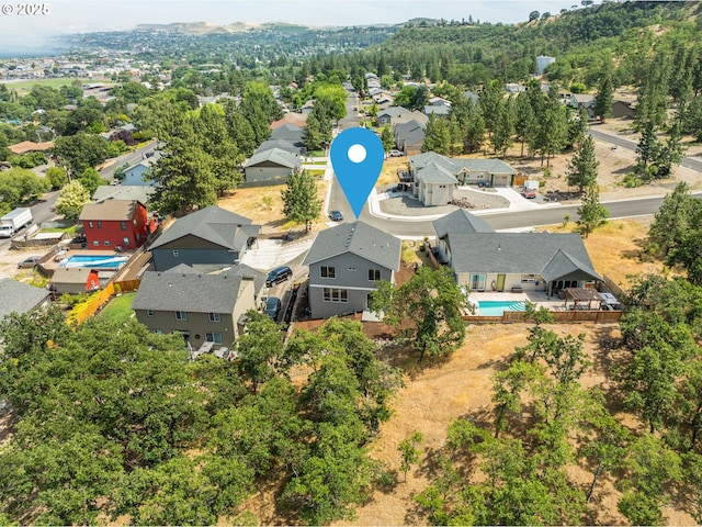 1405 Gordon Ct, The Dalles, OR 97058 - aerial perspective of suburban area featuring a pool area