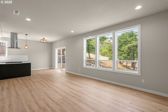 1405 Gordon Ct, The Dalles, OR 97058 - unfurnished living room featuring recessed lighting and light wood-style flooring