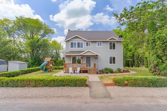 21795 SE Grand Island Loop, Dayton, OR 97114 - view of front of home with a playground and covered porch
