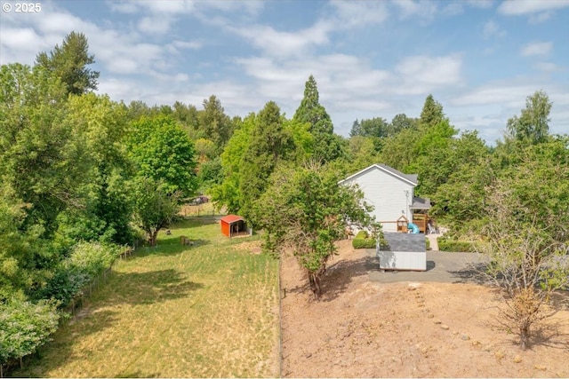 21795 SE Grand Island Loop, Dayton, OR 97114 - view of yard featuring driveway and a storage unit