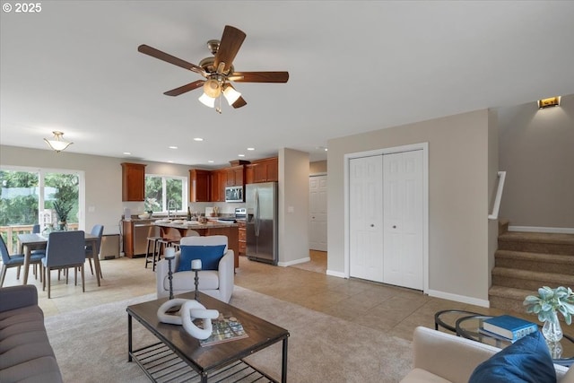21795 SE Grand Island Loop, Dayton, OR 97114 - living room featuring ceiling fan, stairs, light tile patterned floors, and recessed lighting