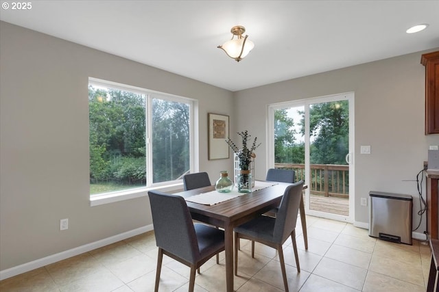 21795 SE Grand Island Loop, Dayton, OR 97114 - dining area with healthy amount of natural light, light tile patterned flooring, and recessed lighting