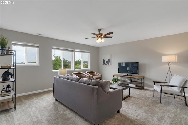 21795 SE Grand Island Loop, Dayton, OR 97114 - living room featuring light colored carpet and a ceiling fan