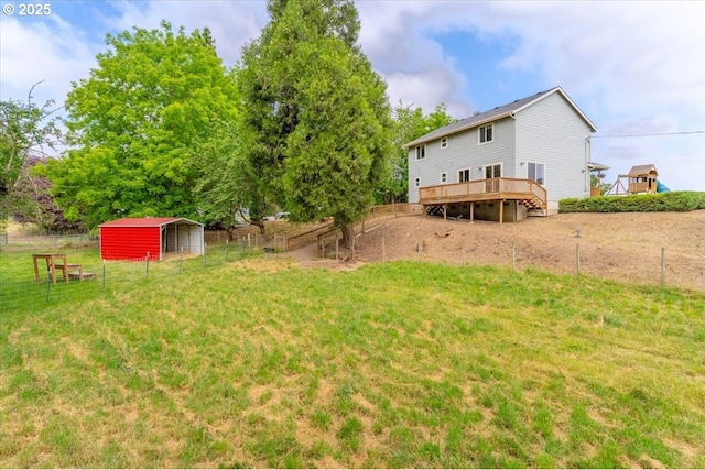 21795 SE Grand Island Loop, Dayton, OR 97114 - view of yard featuring a deck and an outbuilding