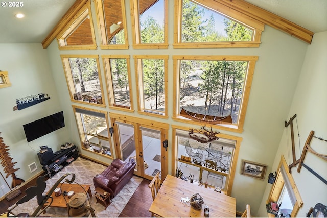 123604 Muttonchop St, Crescent Lake, OR 97733 - living room with high vaulted ceiling, healthy amount of natural light, wood finished floors, beamed ceiling, and recessed lighting