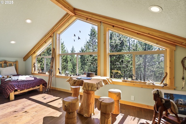 123604 Muttonchop St, Crescent Lake, OR 97733 - bedroom with vaulted ceiling, wood-type flooring, and recessed lighting