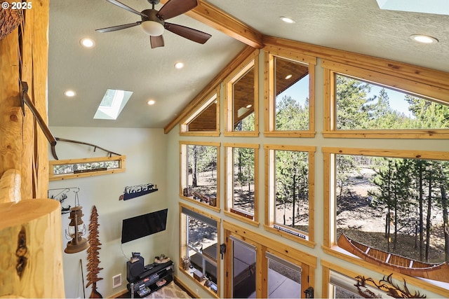 123604 Muttonchop St, Crescent Lake, OR 97733 - living room with a skylight, a textured ceiling, recessed lighting, a ceiling fan, and high vaulted ceiling
