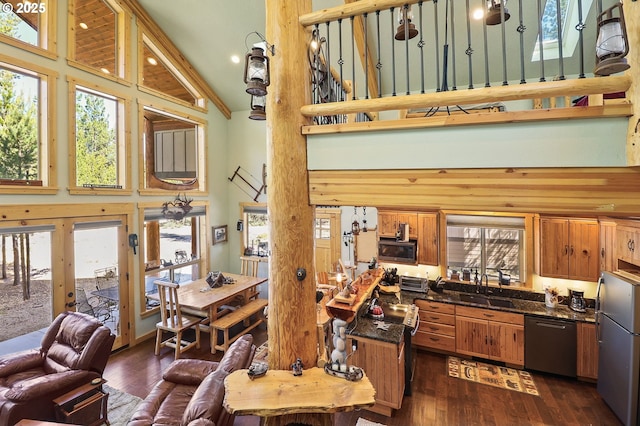 123604 Muttonchop St, Crescent Lake, OR 97733 - living room featuring high vaulted ceiling, dark wood finished floors, french doors, and recessed lighting