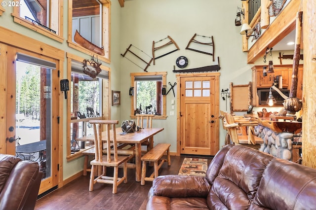 123604 Muttonchop St, Crescent Lake, OR 97733 - dining room featuring dark wood-type flooring and a towering ceiling